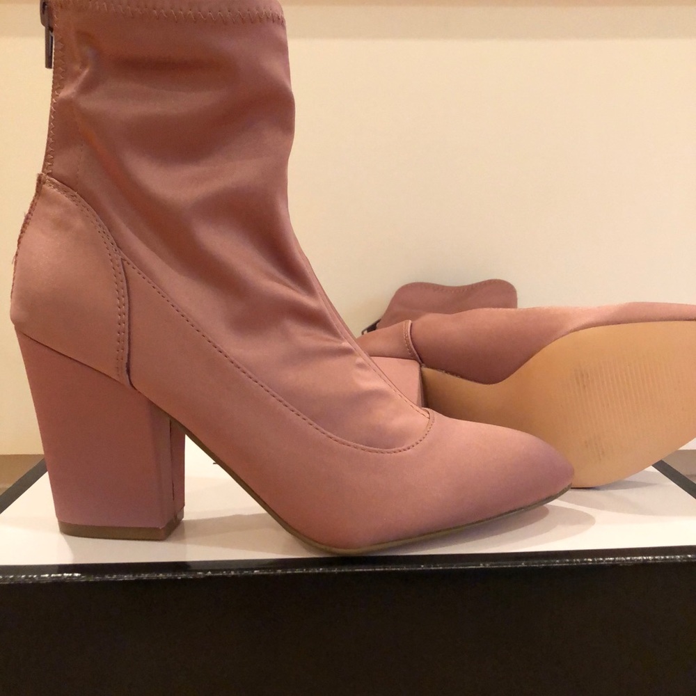 Beautiful brand new pink booties. Fit like a glove